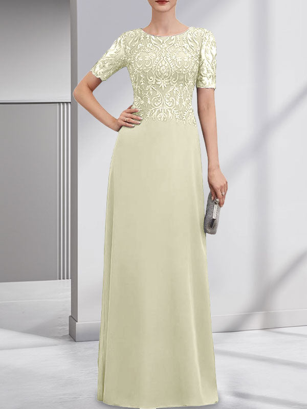 Vestido de novia de corte línea A, escote redondo, largo hasta el suelo, de encaje y gasa con lentejuelas.