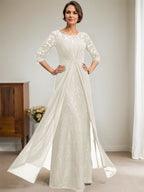 Robe de mariée en mousseline de soie dentelle, coupe trapèze, décolleté illusion, longueur au sol, ornée de perles et de volants 