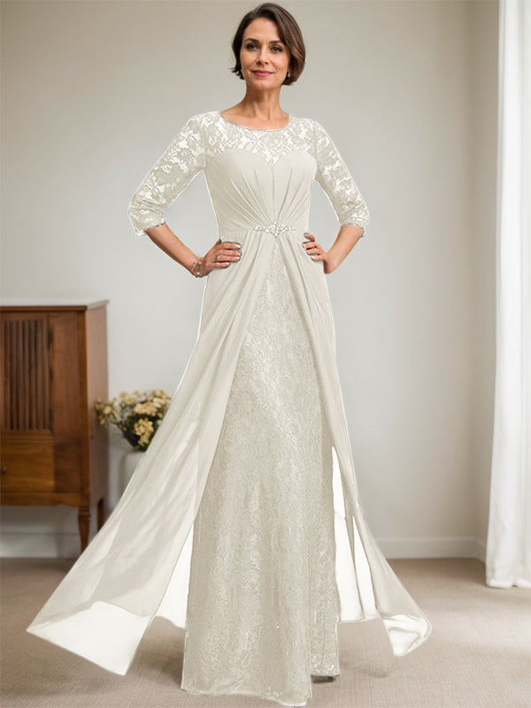 Vestido de novia de corte línea A, escote redondo ilusión, largo hasta el suelo, de gasa de encaje con volantes y pedrería. 