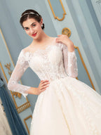 Vestido de novia largo sin mangas con apliques de encaje de tul y hasta el suelo 