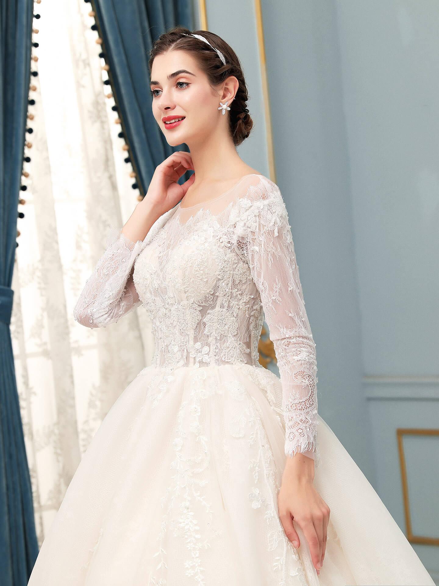 Vestido de novia largo sin mangas con apliques de encaje de tul y hasta el suelo 