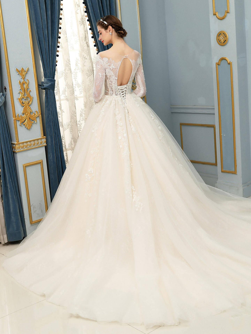 Vestido de novia largo sin mangas con apliques de encaje de tul y hasta el suelo 