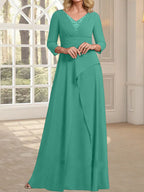 Vestido de gasa de corte A, escote en V, largo hasta el suelo, para la madre de la novia, con plisados ​​y cuentas.