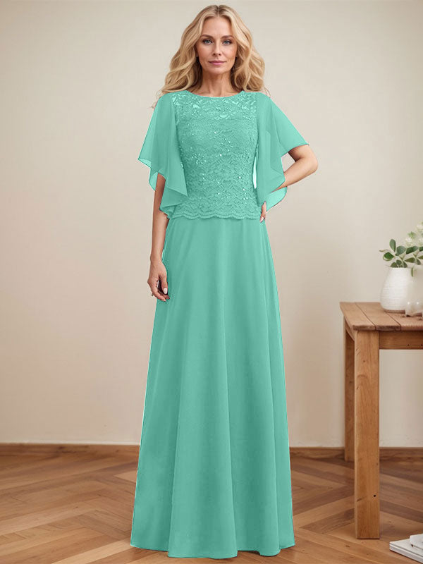 Vestido de novia de corte A, escote redondo, ilusión, largo hasta el suelo, de encaje y gasa con lentejuelas. 