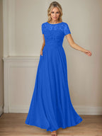 Robe en mousseline de soie bleu marine foncé, coupe trapèze, col bateau et sequins 
