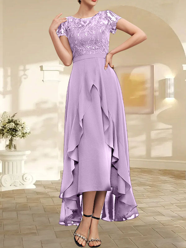 Robe de mère de la mariée asymétrique en mousseline de soie et dentelle, coupe trapèze, décolleté en V, effet illusion, nœud, volants et sequins 