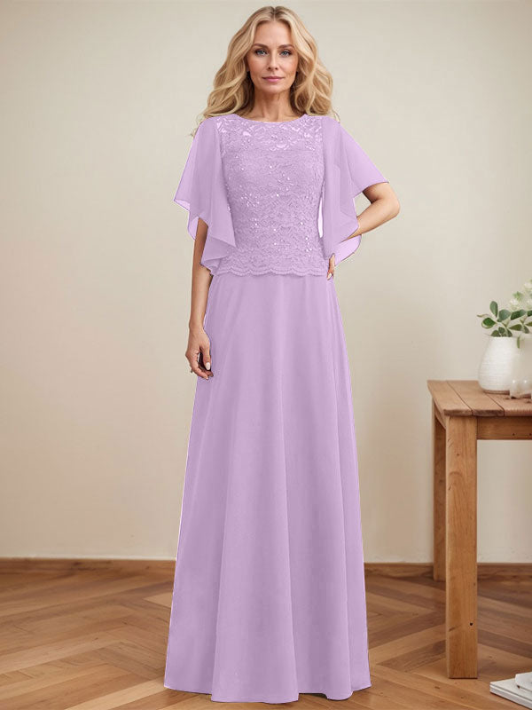 Vestido de novia de corte A, escote redondo, ilusión, largo hasta el suelo, de encaje y gasa con lentejuelas. 