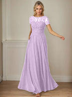 Robe en mousseline de soie bleu marine foncé, coupe trapèze, col bateau et sequins 