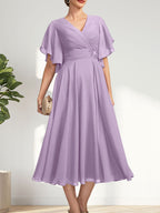 Vestido de corte A, escote en V, largo té, de gasa, para la madre de la novia, con plisados ​​y cuentas.