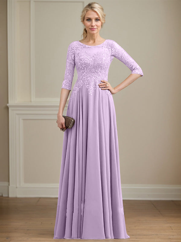 Vestido de novia de corte A, escote redondo, ilusión, largo hasta el suelo, de encaje y gasa con lentejuelas. 