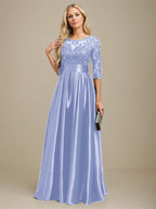 Robe de mariée longue en satin stretch dentelle et dentelle, coupe trapèze, décolleté illusion, ornée d'un nœud à sequins 