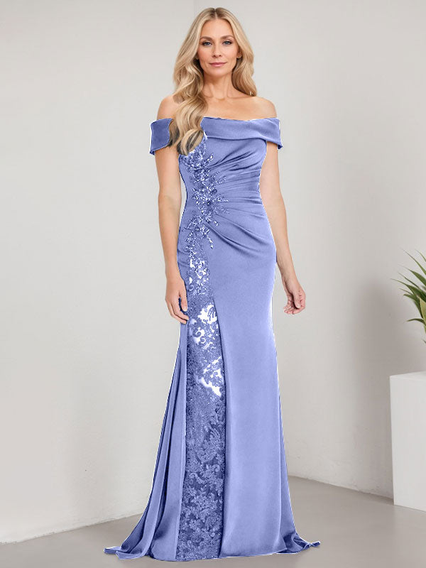 Vestido de corte sirena para la madre de la novia, largo hasta el suelo, con hombros descubiertos, apliques y pedrería, con abertura alta. 