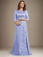 Robe de mère de la mariée en satin de dentelle, coupe trapèze, longue jusqu'au sol, ornée d'appliqués, avec décolleté plongeant et bretelles.