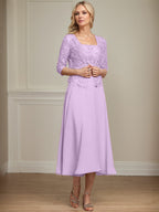 Vestido de corte A, largo midi, de gasa, encaje y lentejuelas para la madre de la novia. 