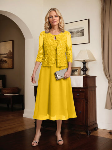 Vestido de novia de corte línea A, escote redondo, largo hasta la rodilla, de encaje y gasa con lentejuelas. 