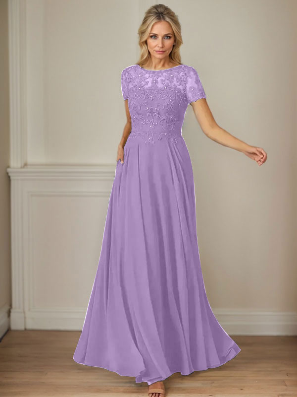 Robe en mousseline de soie bleu marine foncé, coupe trapèze, col bateau et sequins 