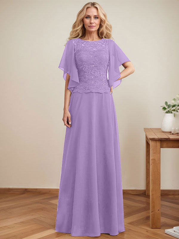 Vestido de novia de corte A, escote redondo, ilusión, largo hasta el suelo, de encaje y gasa con lentejuelas. 