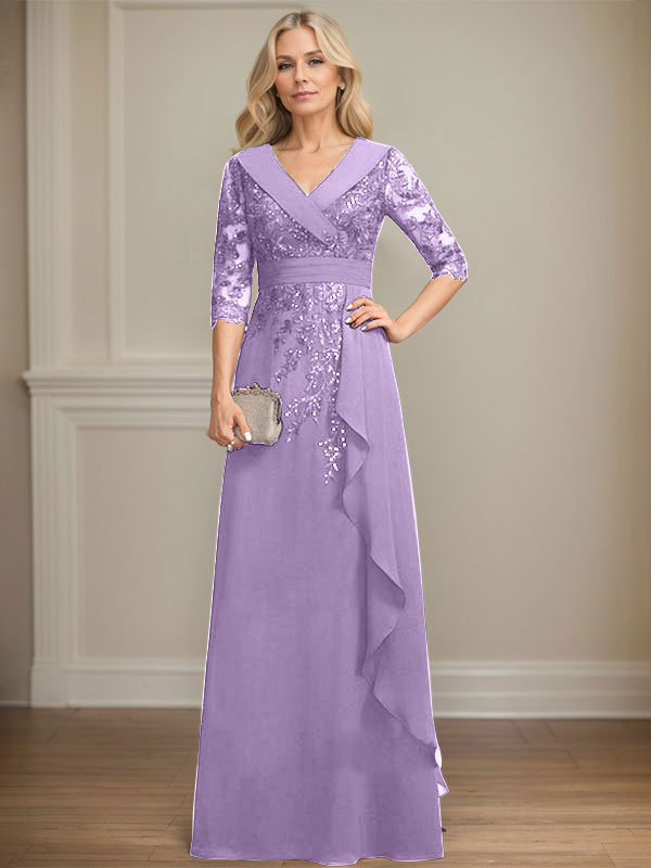 Vestido de novia de corte línea A, cuello en V, largo hasta el suelo, de encaje y gasa, con lentejuelas y volantes en cascada. 