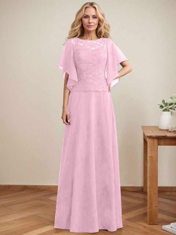 Vestido de novia de corte A, escote redondo, ilusión, largo hasta el suelo, de encaje y gasa con lentejuelas. 