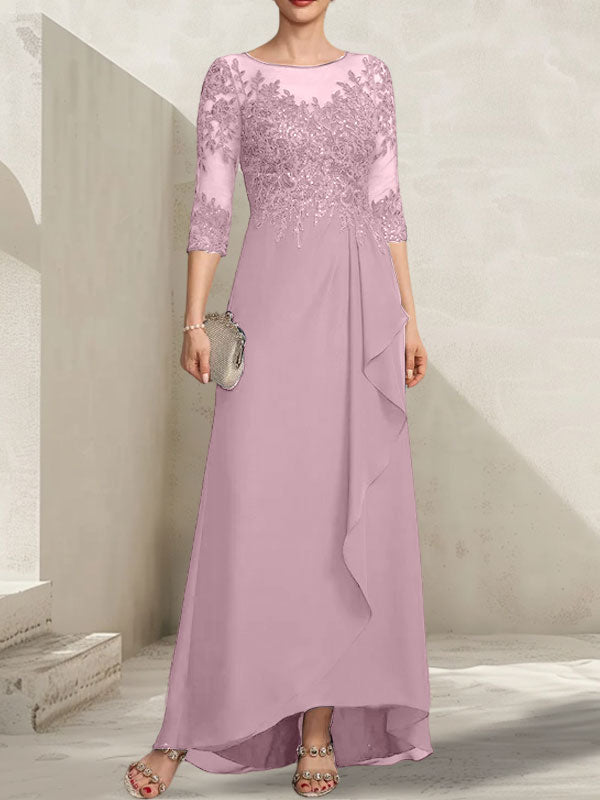 Vestido de madrina de la novia, corte asimétrico, escote ilusión, encaje y gasa, con lentejuelas y volantes en cascada.