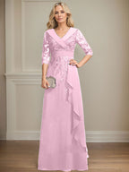 Vestido de novia de corte línea A, cuello en V, largo hasta el suelo, de encaje y gasa, con lentejuelas y volantes en cascada. 