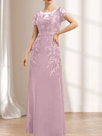 Robe de mère de la mariée en mousseline de dentelle, coupe fourreau/colonne, décolleté illusion, longueur au sol, ornée de sequins