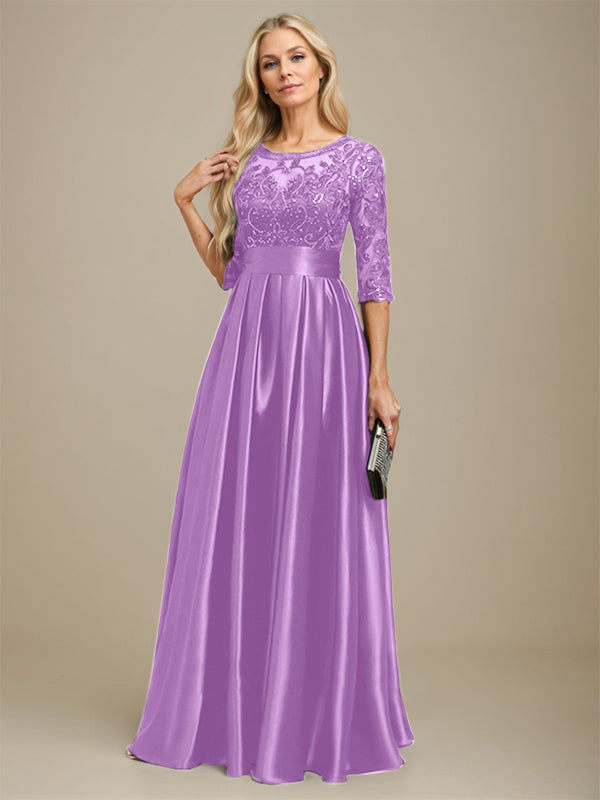Vestido de madrina de la novia, corte en A, escote ilusión, largo hasta el suelo, satén elástico con encaje y lazo de lentejuelas. 
