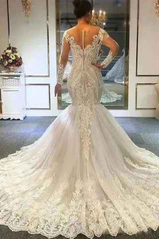 Robe de mariée en dentelle ivoire à manches longues, décolleté cœur et évasée, coupe cœur