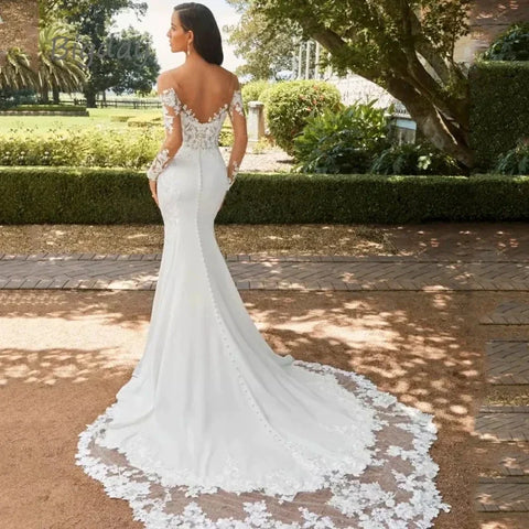 Vestidos de novia de lujo con apliques de encaje, sexys, con espalda descubierta, escote corazón, corte sirena y cola de barrido, ideales para la fiesta nupcial. Amanda Novias 