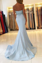 Robe de bal longue sirène à décolleté cœur et corsage perlé 