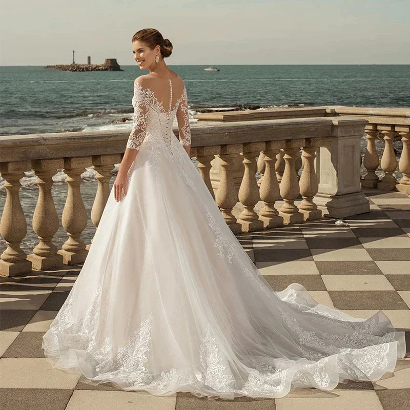 MACDUGAL Exquisite Three-Quarter Sleeves Mopping O-Neck Lace Charming Applique Back Lace Double Button Wedding Dress
