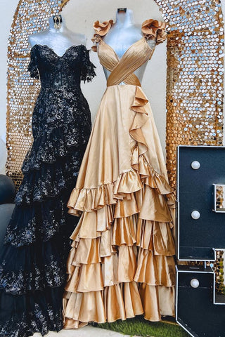 Vestido largo de fiesta corte A con volantes y abertura