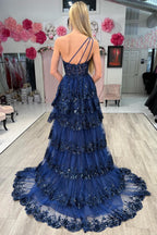 Vestido largo de fiesta de encaje con un solo hombro y volantes