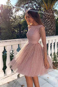 Vestido corto de fiesta rosa con mangas 3/4 y espalda descubierta