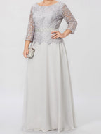 Robe de mère de la mariée longue jusqu'au sol, coupe trapèze/princesse, col rond, manches 3/4, ornée d'appliqués et de sequins 