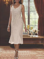 Vestido de dos piezas para la madre de la novia, de gasa con escote en V, chaqueta y lentejuelas. 