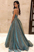 Vestidos largos de fiesta de satén brillante con escote en V, bolsillos y espalda cruzada.