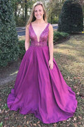 Vestido de graduación fucsia de corte A, escote en V, cola de barrido y bolsillos con cuentas