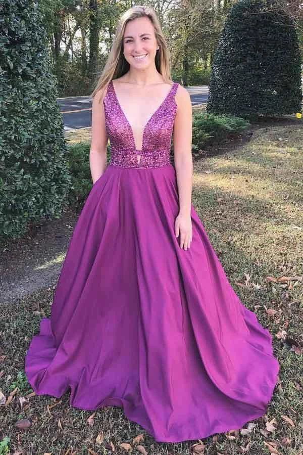 Vestido de graduación fucsia de corte A, escote en V, cola de barrido y bolsillos con cuentas