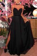 Vestidos largos negros de fiesta con tirantes finos y pedrería, con abertura.