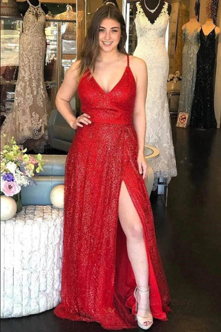 Robe de bal/cérémonie rouge longue à paillettes, dos nu, col en V et fente.