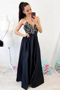 Vestidos largos negros de fiesta con escote en V, tirantes finos, espalda cruzada y encaje.