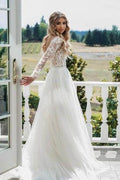 Robe de mariée bohème à manches longues en dentelle florale perlée transparente MW269