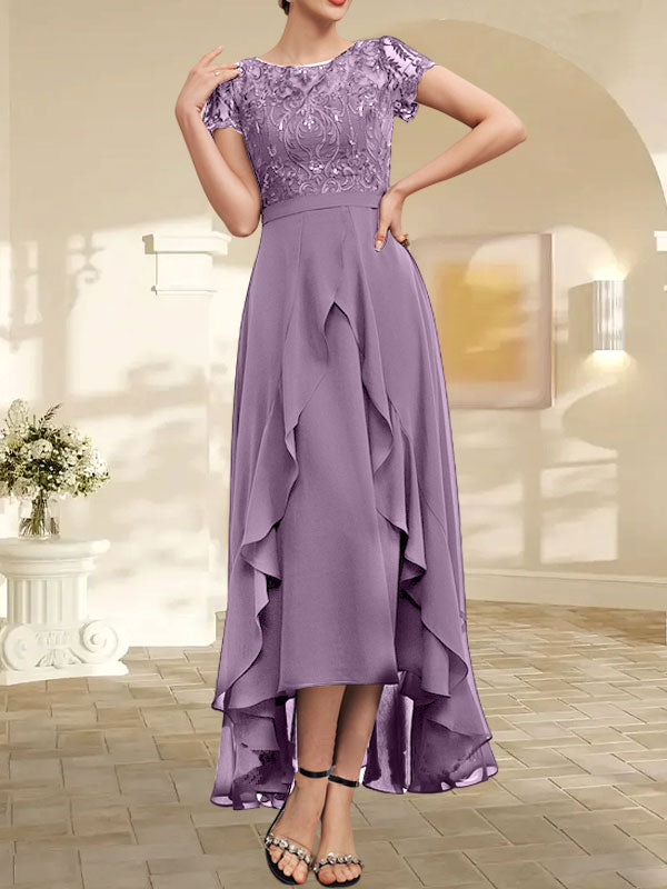 Robe de mère de la mariée asymétrique en mousseline de soie et dentelle, coupe trapèze, décolleté en V, effet illusion, nœud, volants et sequins 