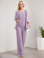 Vestido de novia de gasa con encaje y lentejuelas, estilo mono/pantalón, largo hasta el suelo, con escote redondo.