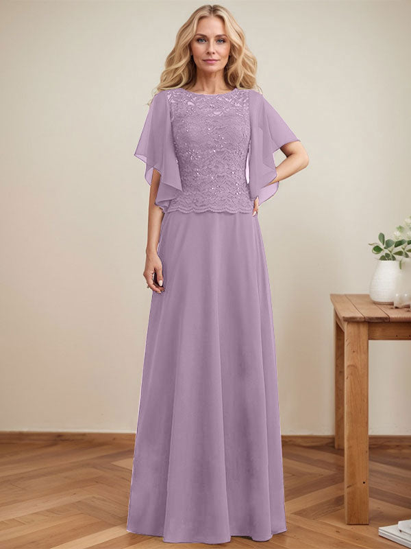 Vestido de novia de corte A, escote redondo, ilusión, largo hasta el suelo, de encaje y gasa con lentejuelas. 