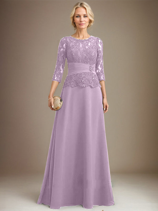 Vestido de corte A, escote ilusión, largo hasta el suelo, de gasa y encaje, para la madre de la novia, con lentejuelas plisadas y pedrería. 