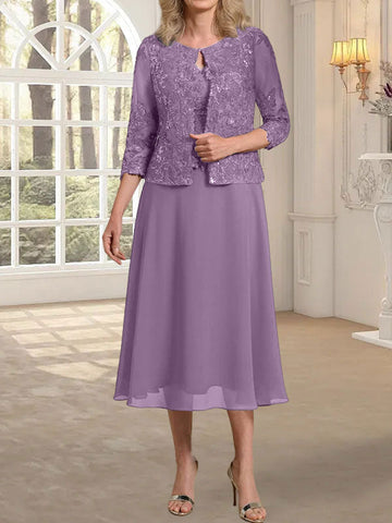 Vestido de novia de corte línea A, escote redondo, largo hasta la rodilla, de encaje y gasa con lentejuelas. 