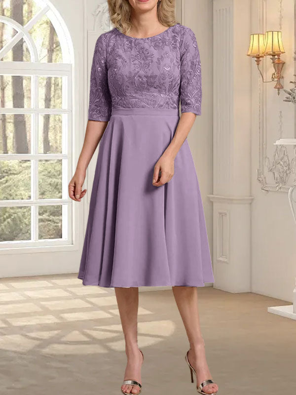 Vestido de novia de gasa de encaje, corte en A, escote redondo y largo hasta la rodilla.