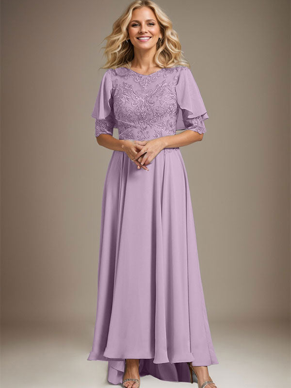 Vestido de novia asimétrico de gasa con encaje, corte en A, escote redondo y ilusión, con pedrería. 